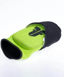 Fighter Reversible Elbow Guard - Black/green PROTECTION 15 Fighter Reversible Elbow Guard - Black/green PROTECTION